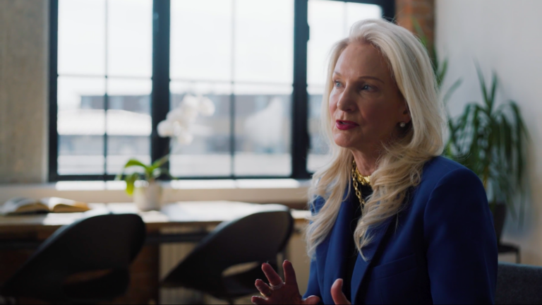 A picture of Nancy Curtin during an interview for a corporate video shot in London by Here Now Films