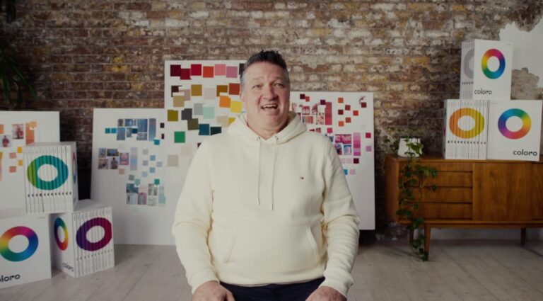 An image of Thorsten Traugott, an employee of Coloro, speaking about the color system in a sit down interview. Taken for a corporate brand film In London for Coloro.