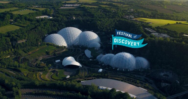 An image of the Eden project from above with a small logo on screen of "the festival of discovery" one of Eden's programs.