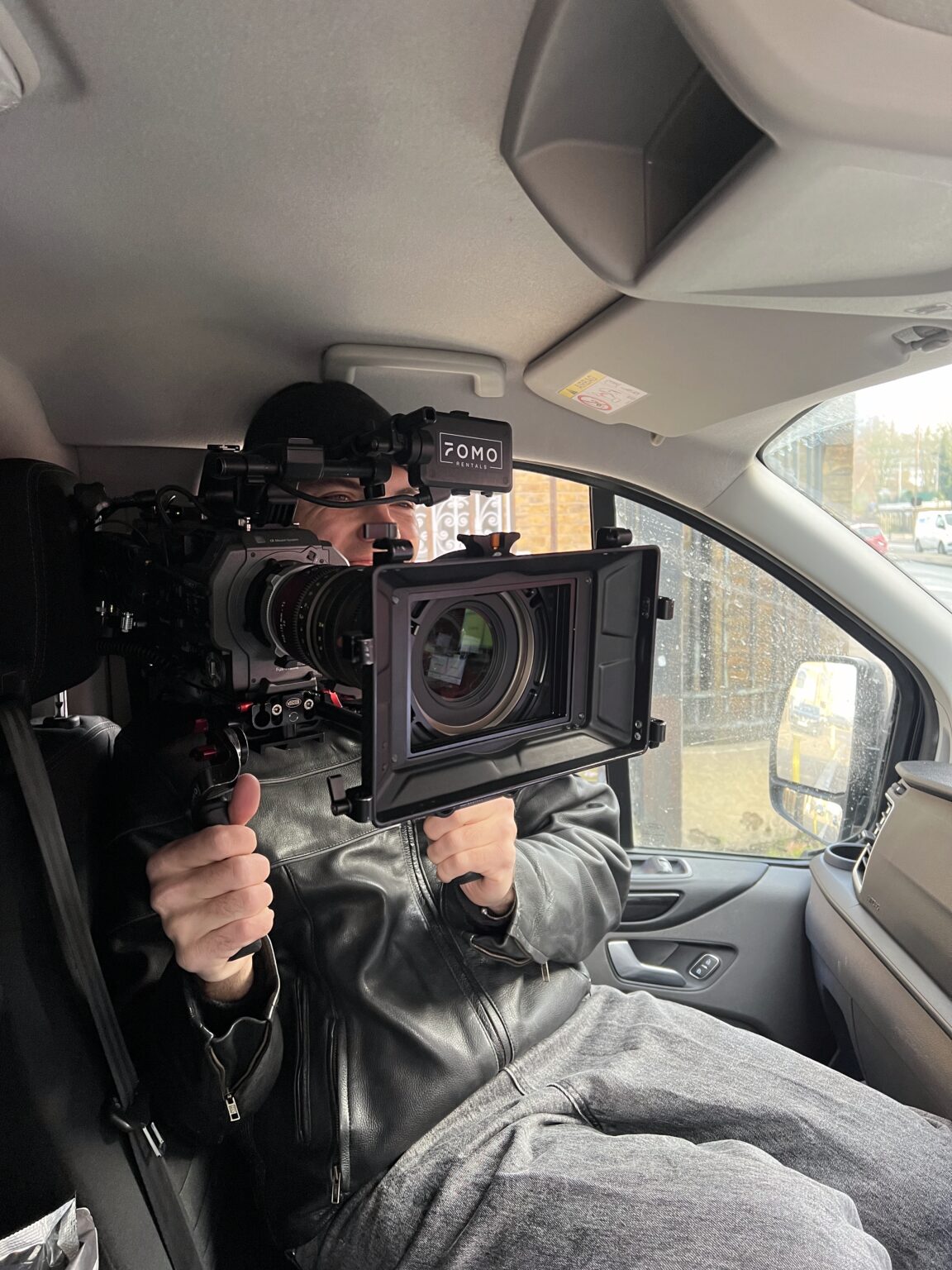 Valentine Global: Nike SNKRS in London 3 A camera operator with a rigged camera in the passenger seat of the van