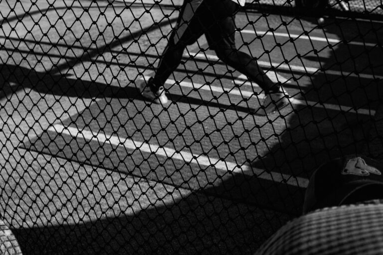 A black and white image of a teniss court pitch for Here Now Films' new video production in London.