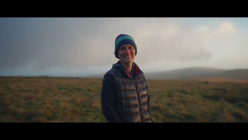 A woman standing on a South West moor at dusk, from The Living Layer
