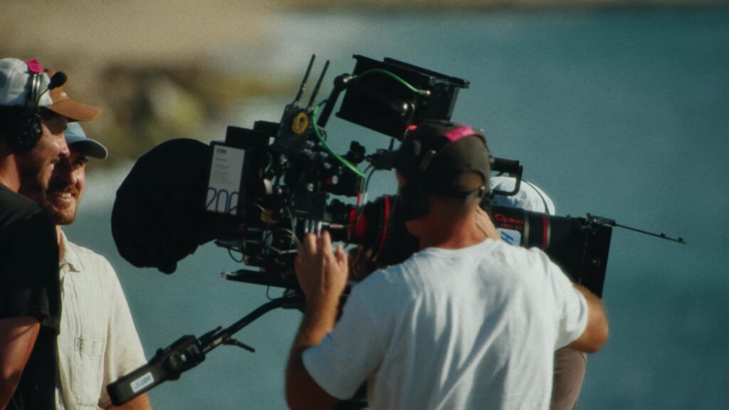A camera operator with the 35mm camera on the Cohere shoot