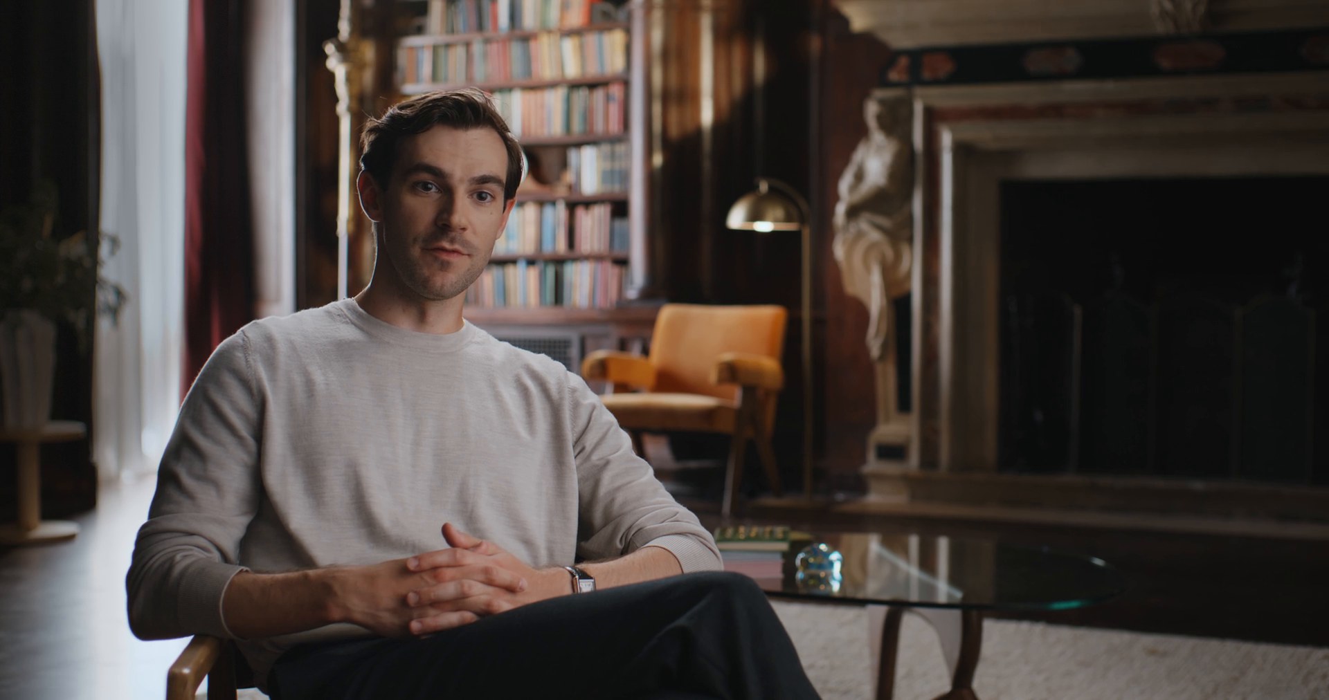 Mark Swan of Nevis in a panelled library on the Upper East Side, from the Nevis × Focus announcement film